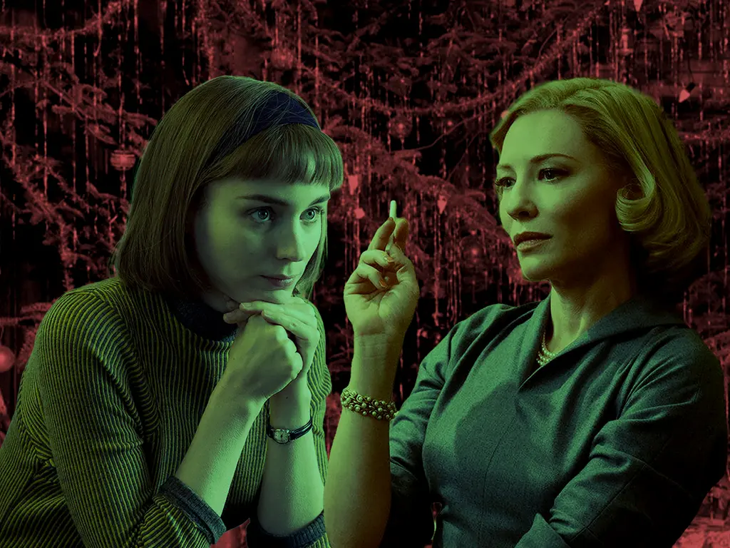 Two women with green-tinted lighting against dark red textured background. Left woman has dark bob haircut, hand near face. Right woman has blonde hair, holding small object.